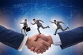 The cooperation concept with people running on handshake Royalty Free Stock Photo