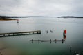 Coos Bay Oregon boat launch area with pier and jetties, drone view