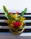 Detail of decorated car with colorful bouquet for the religious tradition of blessing cars in Copacabana, Bolivia