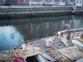 Carpenter working on the mast in Nyhavn Harbour