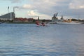 Copenhagen, Denmark - August 21,2017: Beautiful house, canoes, plane, sea and cloud at Nyhavn canal