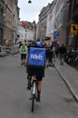 WOLT BIKER WIH BLUE WOLT BACKPACK FOR DELIVERY