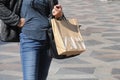 SHOPPER WITH ZARA SHOPPING BAGS IN COPENHAGEN