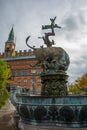 COPENHAGEN, DENMARK: A beautiful fountain with a bronze sculpture of a bull and a dragon. City Hall