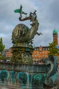 COPENHAGEN, DENMARK: A beautiful fountain with a bronze sculpture of a bull and a dragon. City Hall