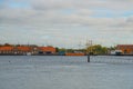 COPENHAGEN, DENMARK: Beautiful panoramic view from the waterfront to the buildings, windmill, boats and the river