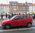 Red car and tourists at Nyhavn, Copenhagen Royalty Free Stock Photo