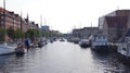 COPENHAGEN, DENMARK - JUL 05th, 2015: Unidentified ships on Christianshavn - canal make a sightseeing by boat through Royalty Free Stock Photo