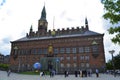 Copenhagen, Denmark - July 2021: Copenhagen City Hall, with wedding registry celebration guests gathered outside.