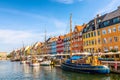 Copenhagen, Denmark - July, 2019: Copenhagen iconic view. Famous old Nyhavn port with colorful medieval houses in the center of