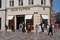 Louis Vuitton customers waiting for thier turn for shop