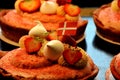 Strawberry cakes decorated with danish flags in bakery