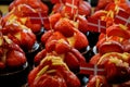 Strawberry cakes decorated with danish flags in bakery