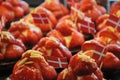 Strawberry cakes decorated with danish flags in bakery