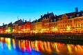 Copenhagen, Denmark - July, 2019: View of the old Nyhavn canal of Copenhagen in the evening sunset Royalty Free Stock Photo