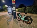 Copenhagen, Denmark - June 24 2022: Bicycle Electric rental bicycle on Copenhagen street near bus stop
