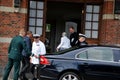 H.M.the Queen Margrethe II of Denmark arrives with her pet Royalty Free Stock Photo