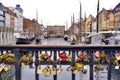 Boats at the Nyhavn waterfront with love locks in the foreground Royalty Free Stock Photo