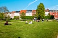 People relaxing at the King`s garden next to Rosenborg castle Royalty Free Stock Photo