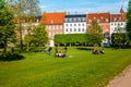 People relaxing at the King`s garden next to Rosenborg castle Royalty Free Stock Photo