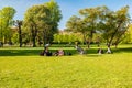 People relaxing at the King`s garden next to Rosenborg castle Royalty Free Stock Photo