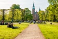 People relaxing at the King`s garden next to Rosenborg castle Royalty Free Stock Photo