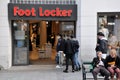 Customers waiting thier turn at Foot Lokckers store -covid-19