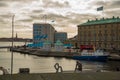 COPENHAGEN, DENMARK: Metallic statue in thinking position person -Zinkglobal -on the embankment in Copenhagen