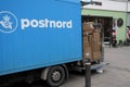 Postnord parclet and packet deliveru man in Copenhagen