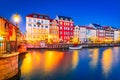 Copenhagen, Denmark. Nyhavn, Kobenhavn\'s iconic canal, colorful night water reflection Royalty Free Stock Photo