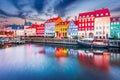 Copenhagen, Denmark. Nyhavn, Kobenhavn\'s iconic canal, colorful night water reflection Royalty Free Stock Photo