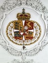 Code of Arms with intricate framing designs on the ceiling