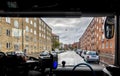 View of suburbia from inside a public shuttle bus
