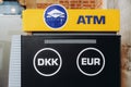 Copenhagen, Denmark - September 14, 2019. Euronet ATM located at the Copenhagen Central station offers danish krones and euro