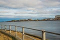 COPENHAGEN, DENMARK: White windmills on the horizon on the waterfront. Beautiful panoramic view from the waterfront