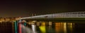 Copenhagen inner harbor bridge at night, waterfront bike lane re Royalty Free Stock Photo