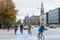 Copenhagen - October 23, 2016: Cyclers passing by a street in Copenhagen. Royalty Free Stock Photo