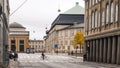 Copenhagen - October 23, 2016: A view to a gallery passing and some Cyclers. Royalty Free Stock Photo
