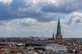 Copenhagen skyline. Denmark capital city streets and danish house roofs. Copenhagen old town and copper spiel of Nikolaj Church