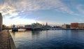 Copenhagen streets of Slotsholmen district, canal and bridges with clear blue sky during sunset time Royalty Free Stock Photo