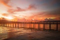 Cople walking on look sunset wooden bridge Royalty Free Stock Photo