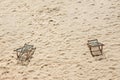 Cople wood chairs on the beach. Royalty Free Stock Photo
