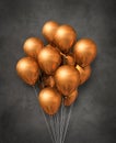 Copper air balloons group on a concrete background