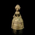 Copper antique bell in the shape of a girl in a magnificent dress.