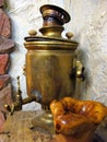 Copper antique samovar, in Russian style. It is in the old Russian house