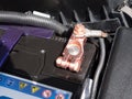 Copper battery terminal of a car close-up Royalty Free Stock Photo