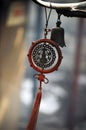 A bell and a beautiful ornament hung on the tree Royalty Free Stock Photo