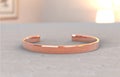 Copper bracelet close-up in interior, mock-up for custom product Royalty Free Stock Photo