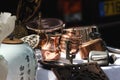 Copper and brass utensils on a French flea market Royalty Free Stock Photo