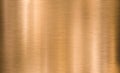 Copper or bronze brushed metal background or texture Royalty Free Stock Photo